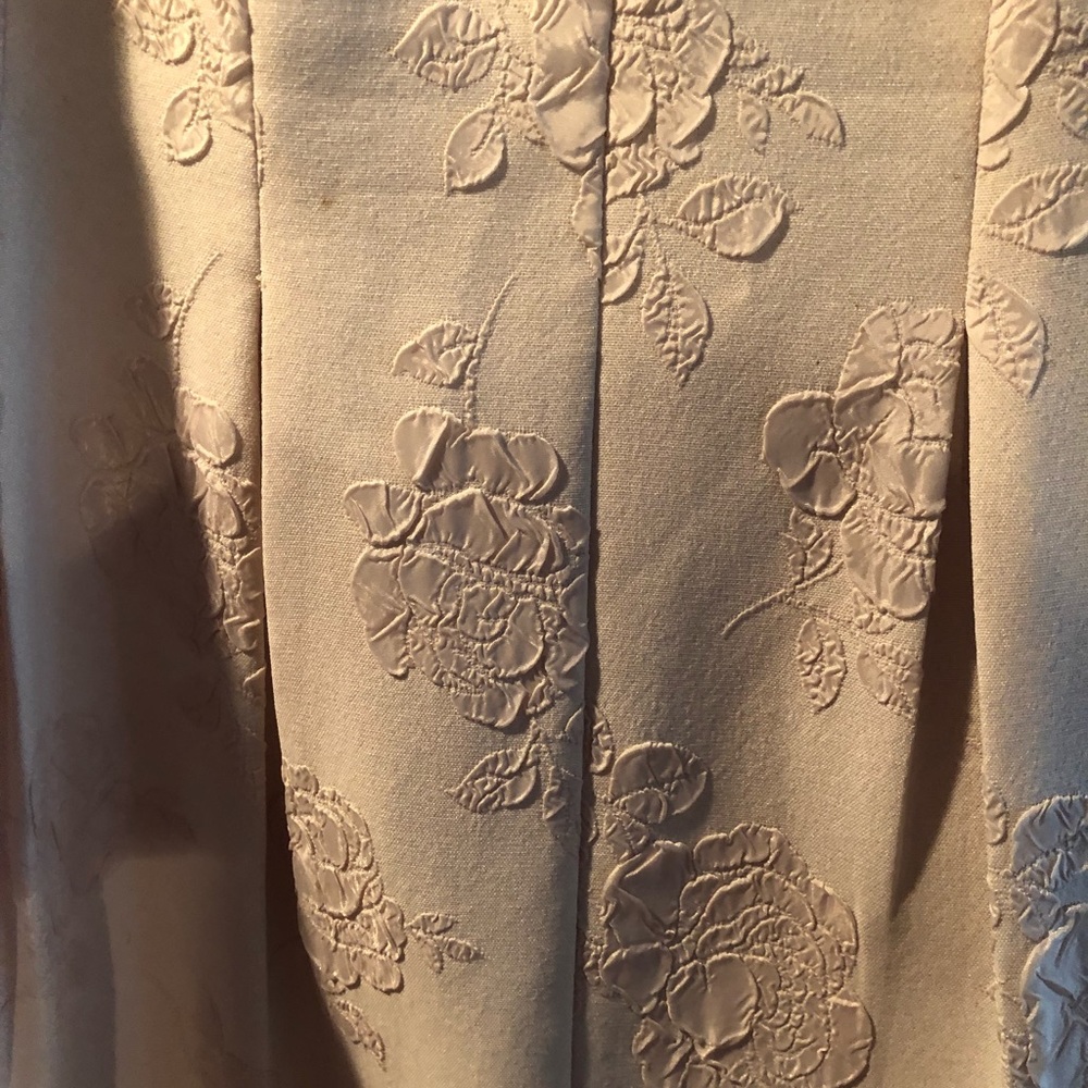 Great neutral brocade dress.Flattering shape with v neck and soft A line skirt